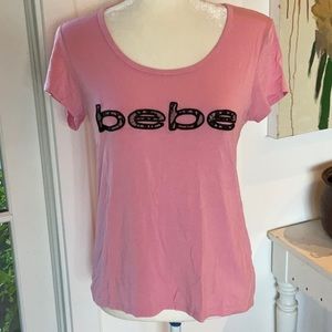 Bebe Sport scoop neck tee top, slightly longer in back.